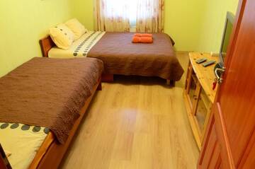 Фото номера Полулюкс с сауной Апартаменты Cat Garden Riga Airport Apartments г. Mežares 50